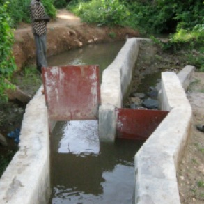 Modern sluice gates on traditional irrigation